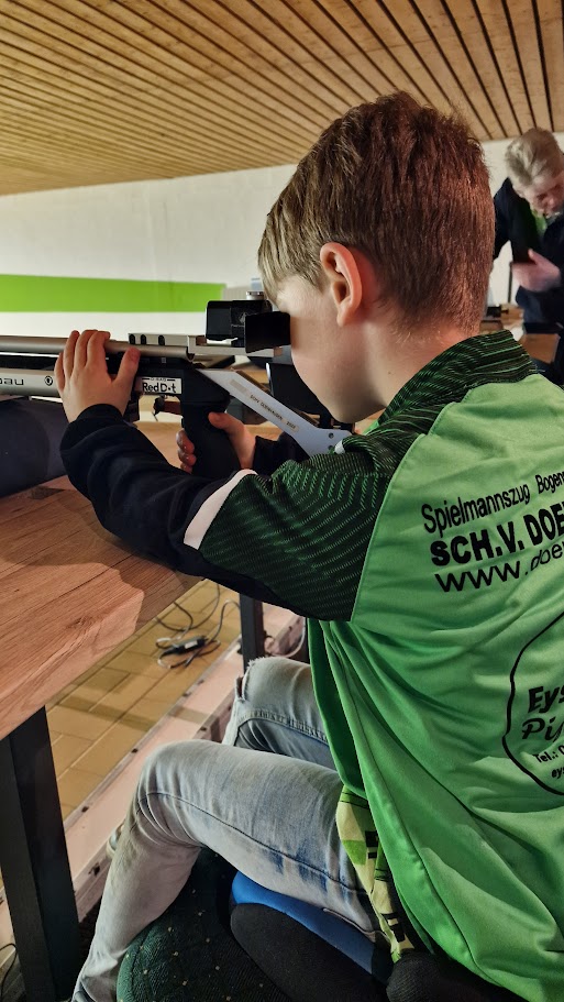 2025 Lichtpunktgewehr sitzend